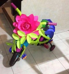 triciclo decorado con flores